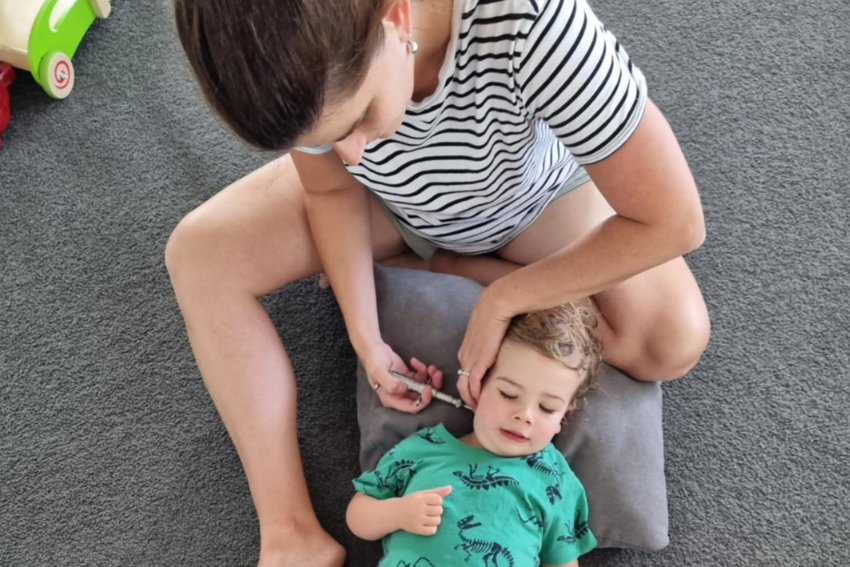 Kristy providing gentle paediatric chiropractic care